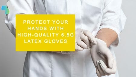 worker in lab coat putting on white latex gloves