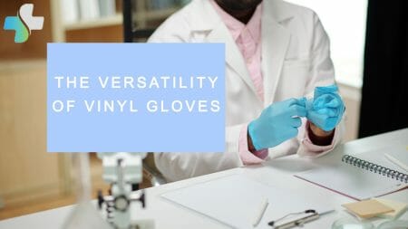 medical professional wearing a pair of blue vinyl gloves while working in the laboratory